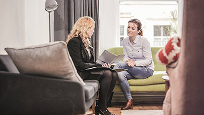 Lady at home having a meeting with relationship manager