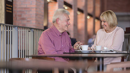 Mature couple drinking coffee