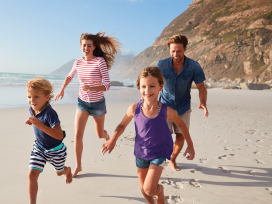 Family running on the beach Family running on the beach