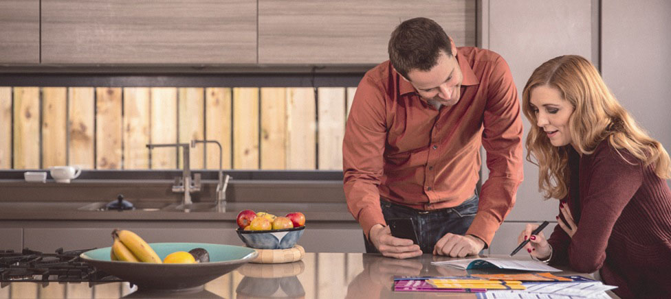 Man and lady in kitchen