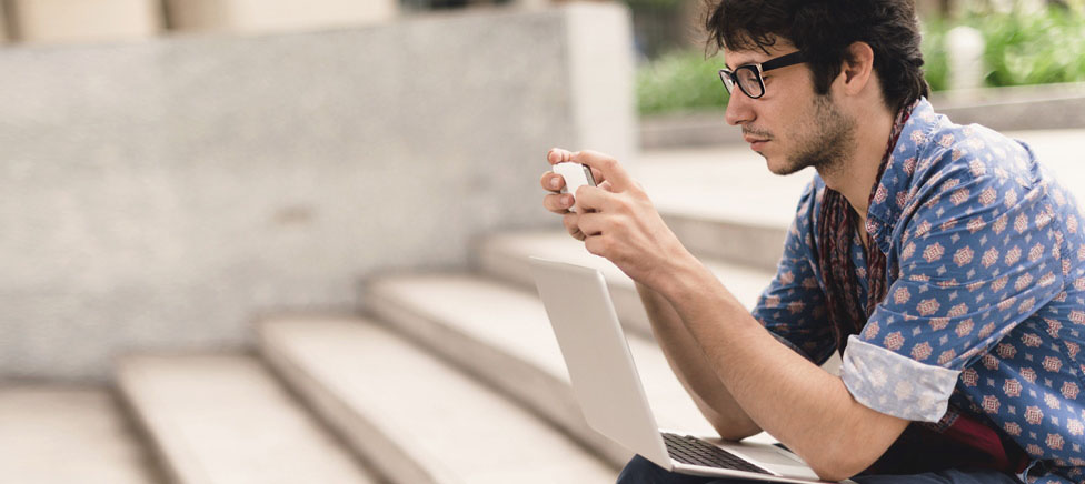 Man outside using mobile phone